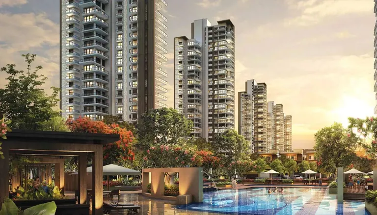 Indiabulls Estate and Club towers above the landscaped pool and cabanas at sunset, artist's impression