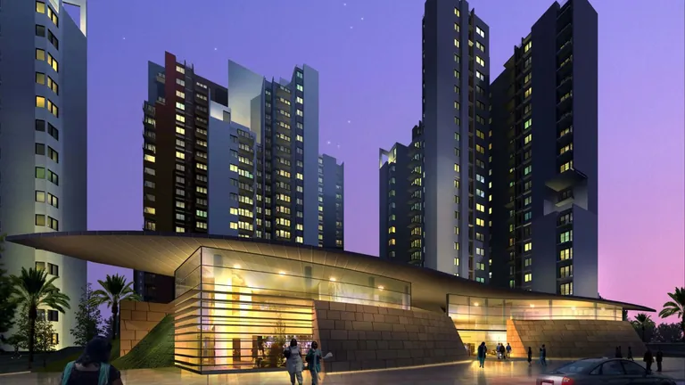 Ireo Uptown clubhouse with curved roof in front of the towers at dusk, artist's impression