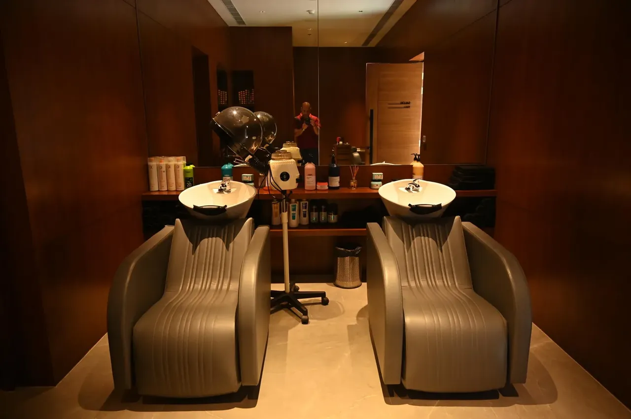 Krisumi Waterfall Residences salon with hair-wash stations in the clubhouse, actual photo