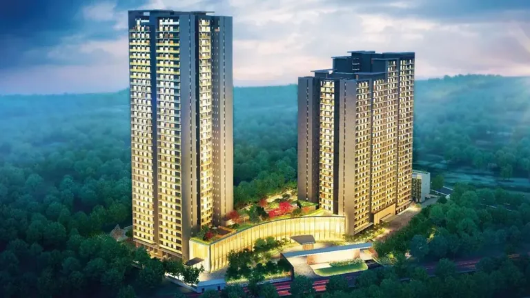 Krisumi Waterfall Residences two towers above the podium at dusk, aerial view, artist's impression