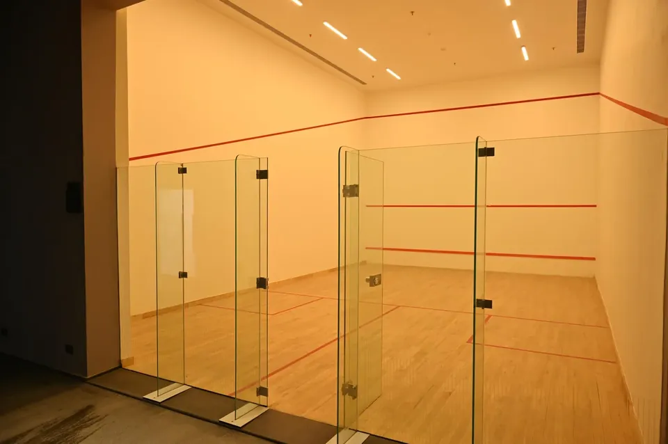Krisumi Waterfall Residences glass-backed squash court in the clubhouse, actual photo