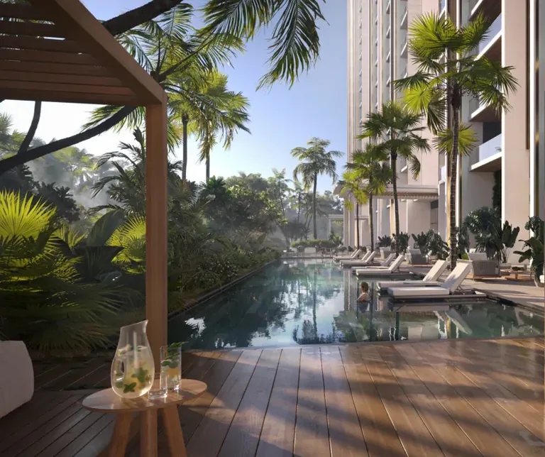 M3M Altitude pool deck with loungers and timber cabanas between the towers, artist's impression