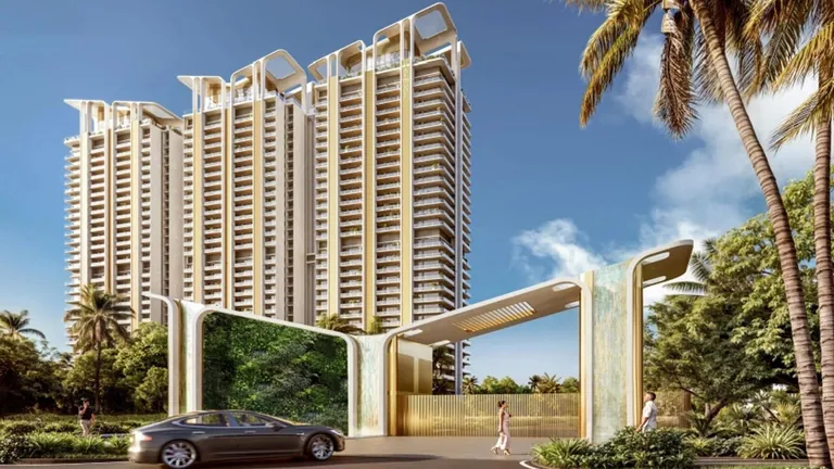 M3M Altitude towers behind the landscaped entrance gate with green wall, artist's impression