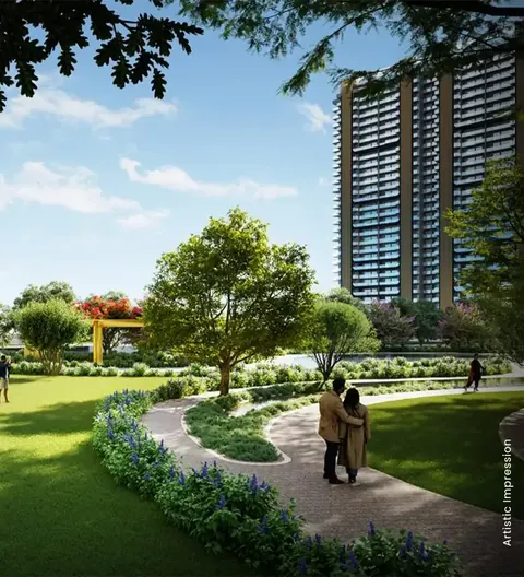 M3M Crown garden walk between the towers with a family on the path, artist's impression
