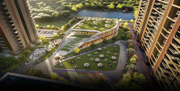 M3M Crown waterfront club with its curved green roof, seen from a tower, artist's impression