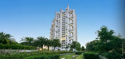 M3M Escala actual photo of the tower rising above landscaped gardens