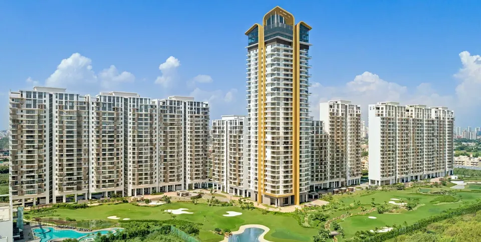 M3M Golfestate St Andrews tower and Fairway towers beside the golf course, artist's impression