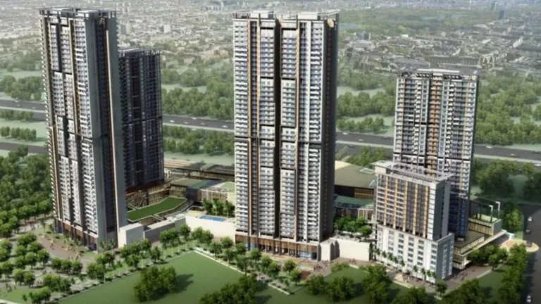 M3M Heights residential towers seen from above with the surrounding greenery, artist's impression