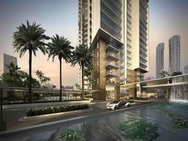 M3M Latitude entrance drive and drop-off with water feature at dusk, artist's impression