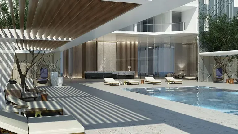 M3M Latitude swimming pool deck with loungers under a slatted canopy, artist's impression