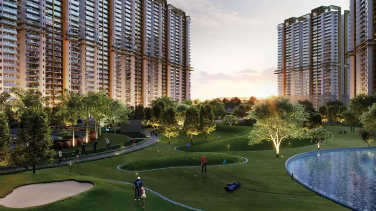 M3M Mansion golf chip-and-putt green and lake with the towers behind, artist's impression