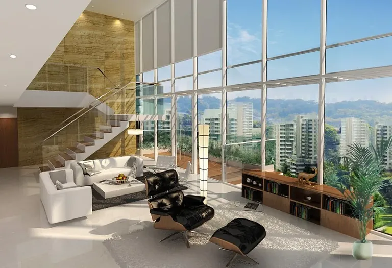 M3M Merlin double-height living room with a glass staircase and city view, artist's impression