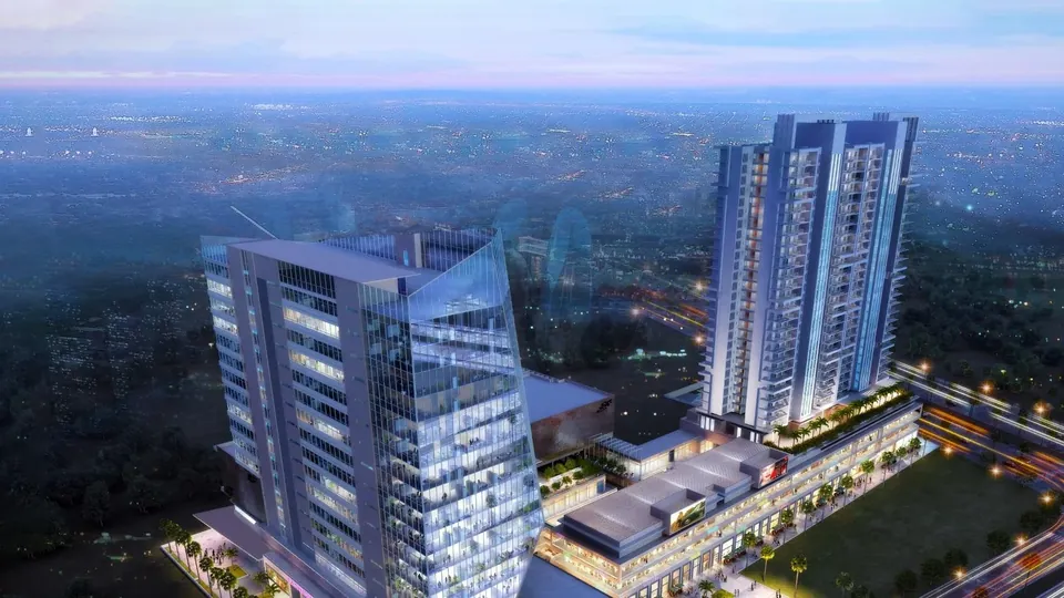 M3M Skywalk aerial evening view of the towers and office block, artist's impression