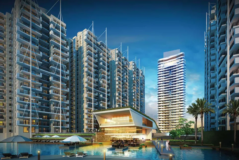 M3M The Marina clubhouse on the waterfront with the ripple tower behind, artist's impression