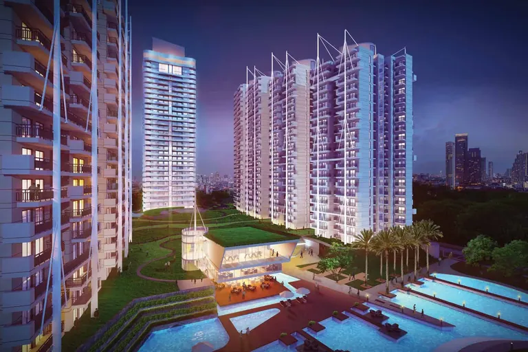 M3M The Marina evening view of towers, clubhouse and pools, artist's impression