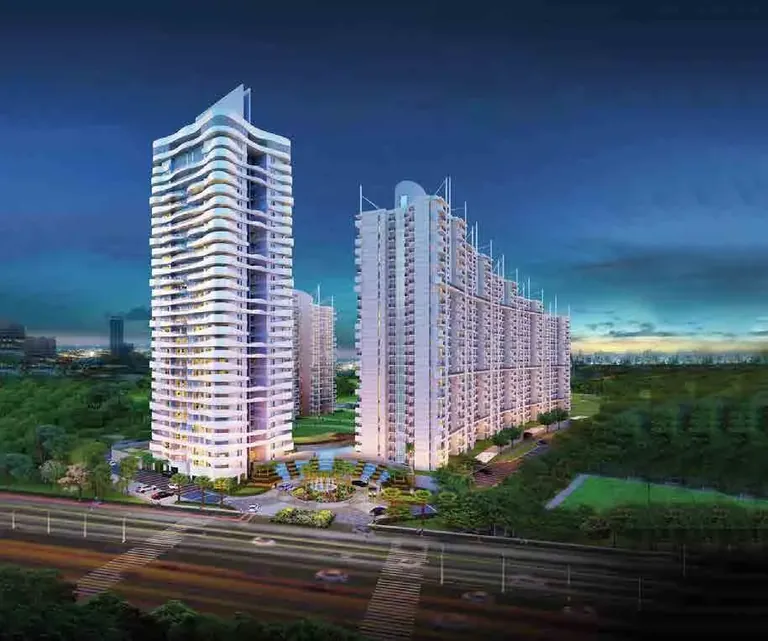 M3M The Marina towers seen from the sector road at night, artist's impression
