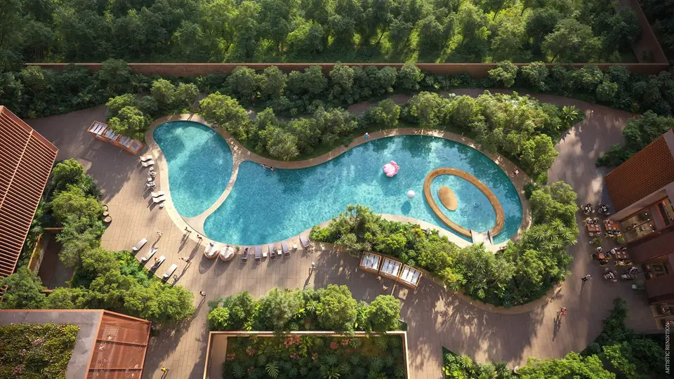 Max Estate 360 free-form swimming pool and sun deck among trees, aerial view, artist's impression