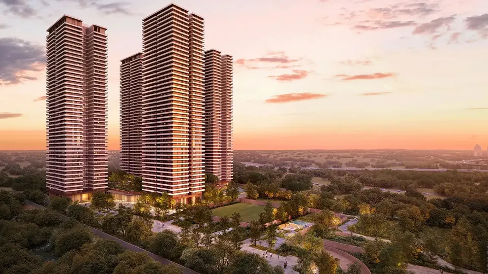 Max Estate 361 five residential towers at sunset above the forest landscape, artist's impression
