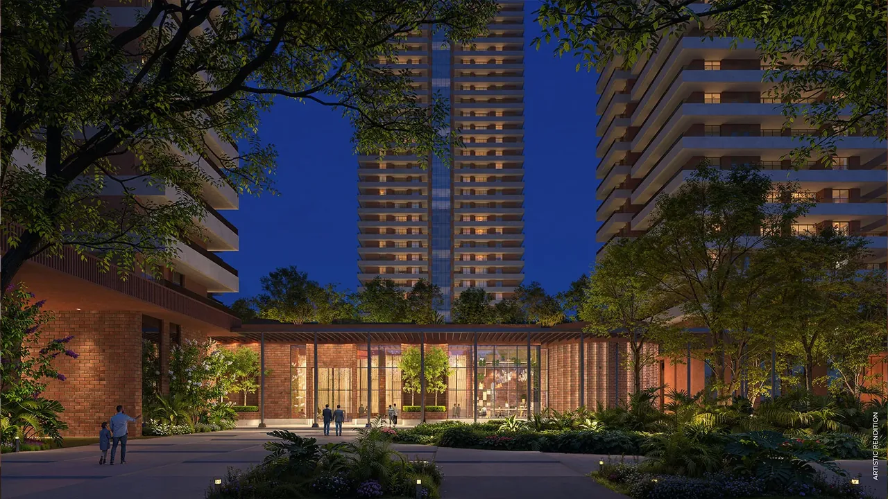 Max Estate 361 glass clubhouse lit at night beneath the towers, artist's impression