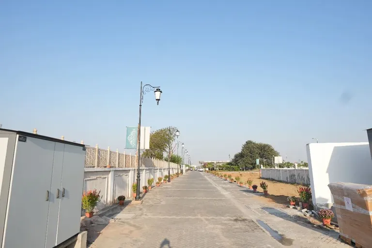 Meffier Golden Park plotted street with the boundary wall