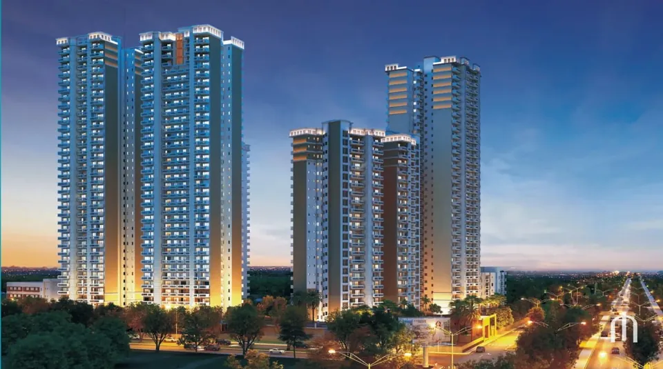 Pareena Mi Casa towers lit up at dusk, artist's impression