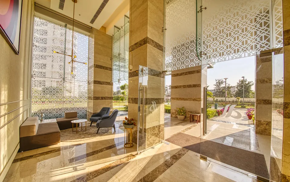 Pioneer Araya lobby lounge with double-height glazing