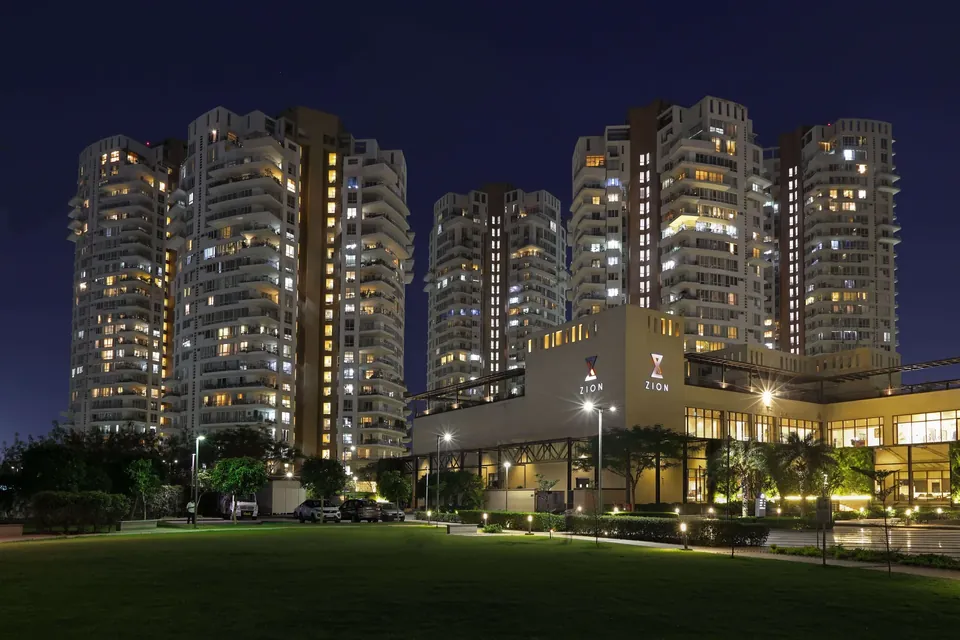 Pioneer Urban Presidia towers and club at night