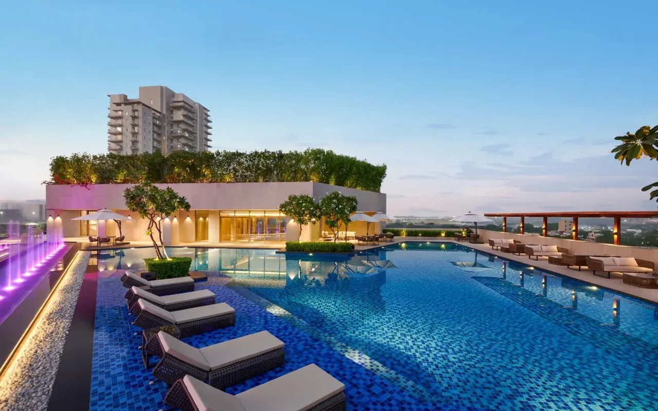 Puri Diplomatic Residences residents share the Diplomatic Greens club and its pool, pictured