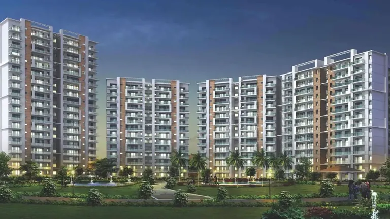 Shree Vardhman Victoria towers at dusk above landscaped greens, Sector 70 Gurgaon, artist's impression