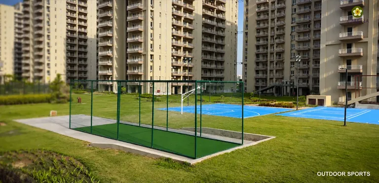 Silverglades The Melia First Citizen cricket nets and courts beside the towers