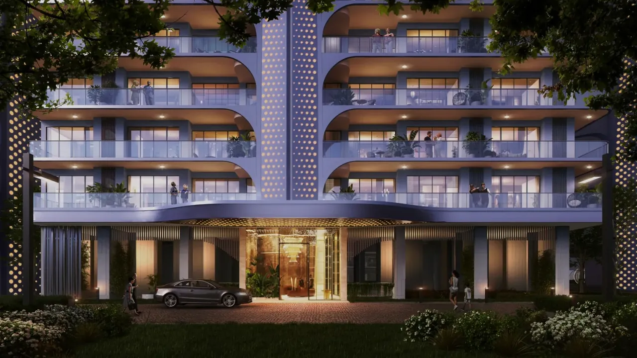 Smartworld The Edition tower entrance and drop-off lit up in the evening, artist's impression