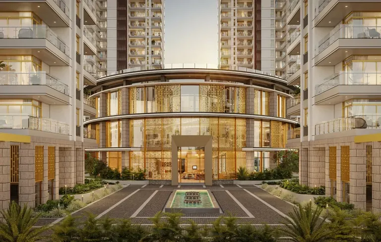 TARC Ishva clubhouse with its curved glass front between the towers, artist's impression