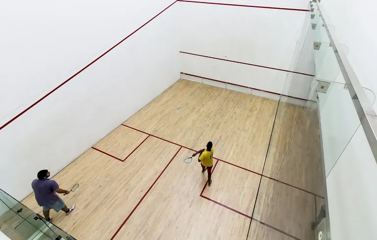 Tata Raisina Residency squash court in the club
