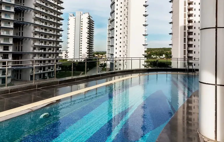 Tata Raisina Residency swimming pool between the towers