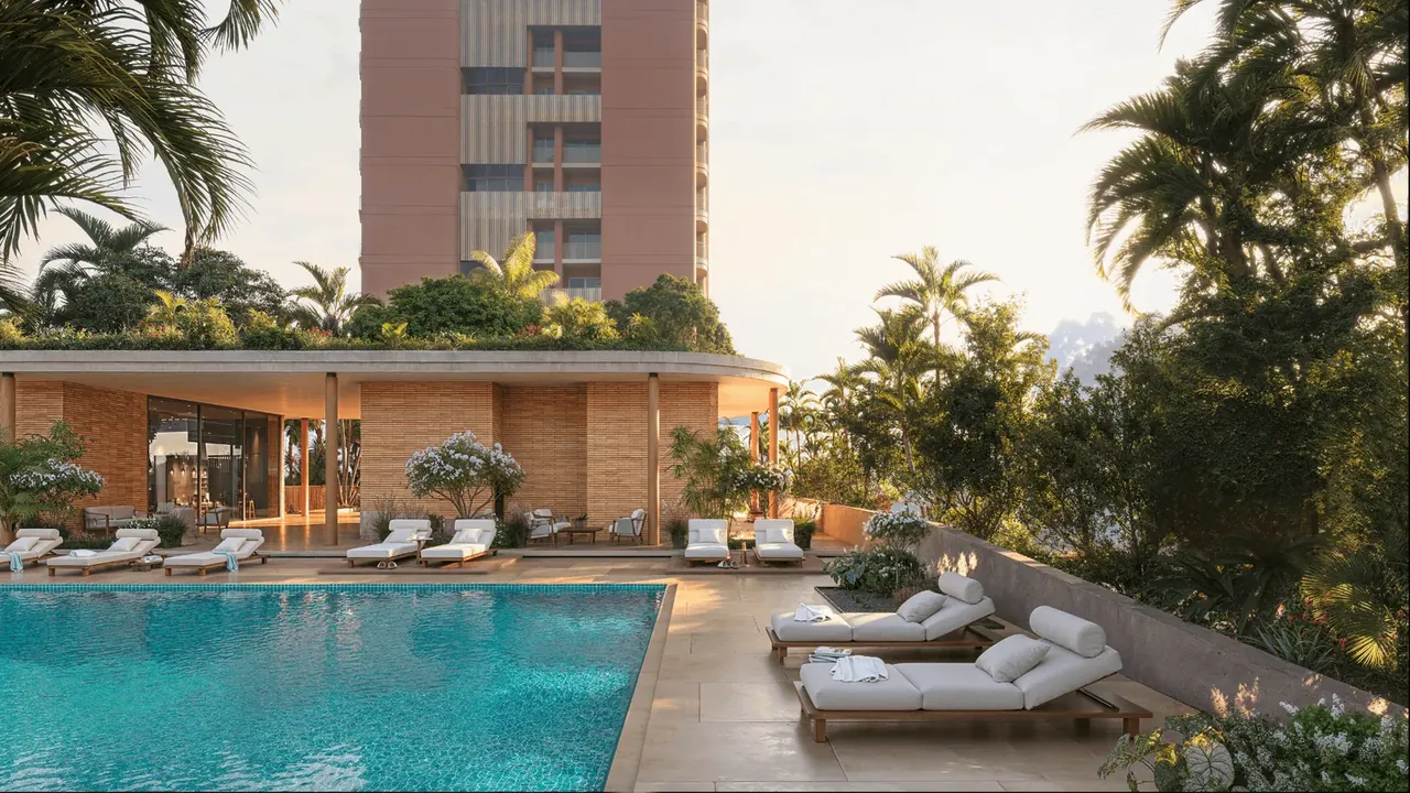 The Terraces at Estate 361 pool deck with loungers under palms at the tower base, artist's impression