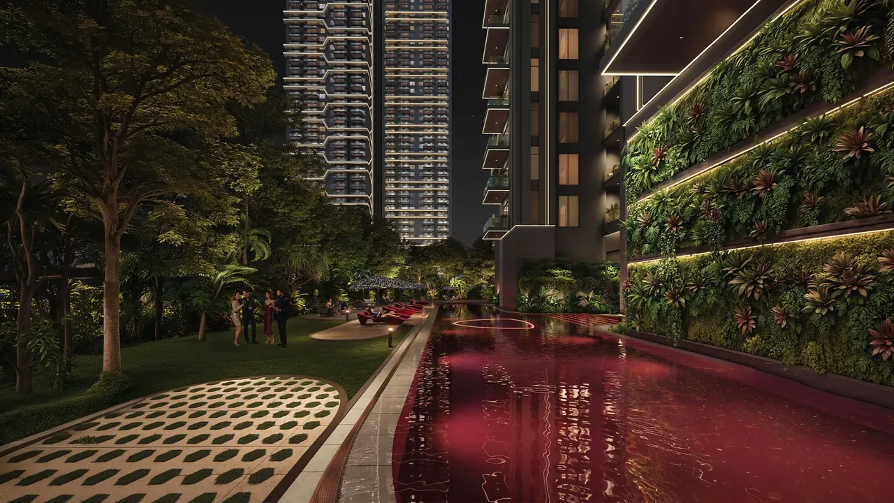 Tonino Lamborghini Residences swimming pool beside the green wall at night, artist's impression