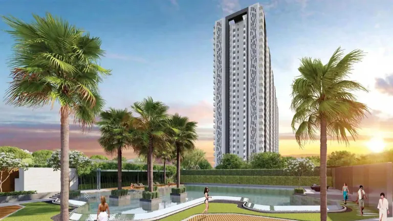 Tulip Yellow high-rise tower seen across palm-lined landscaped deck at sunset, artist's impression